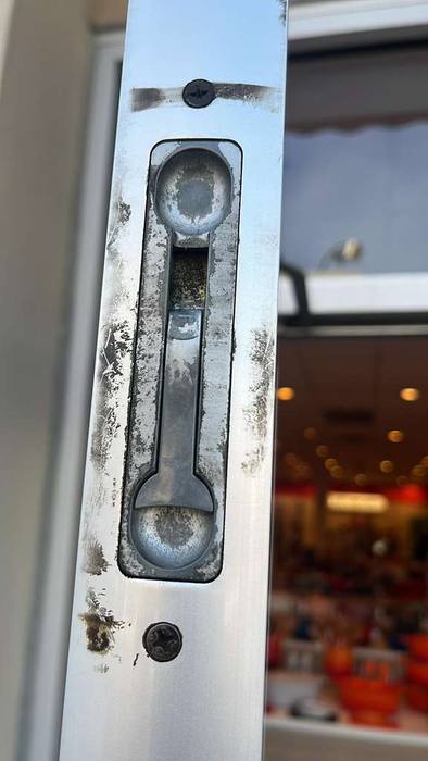 Worn sliding door lock mechanism